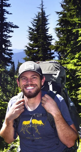 Image of Shawn Fels, Owner of Portland Creamery and Cheesorizo, backpacking in a forest
