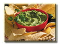 Photo of guacamole (and chips) as example of food using high pressure processing