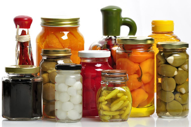Assorted preserved foods in glass jars