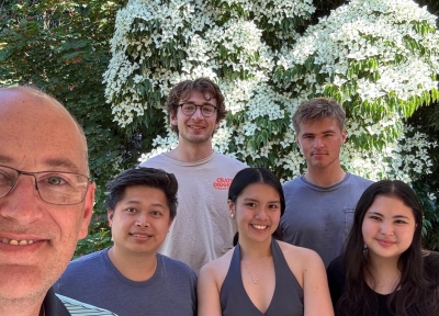 Chris Curtin & 5 students standing outside