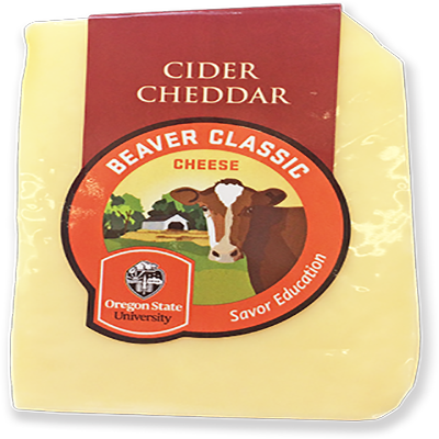 Image of wedge of cider soaked cheddar variety of Beaver Classic Cheese