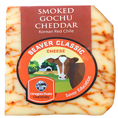 Image of wedge of Smoked Gochu cheddar variety of Beaver Classic Cheese